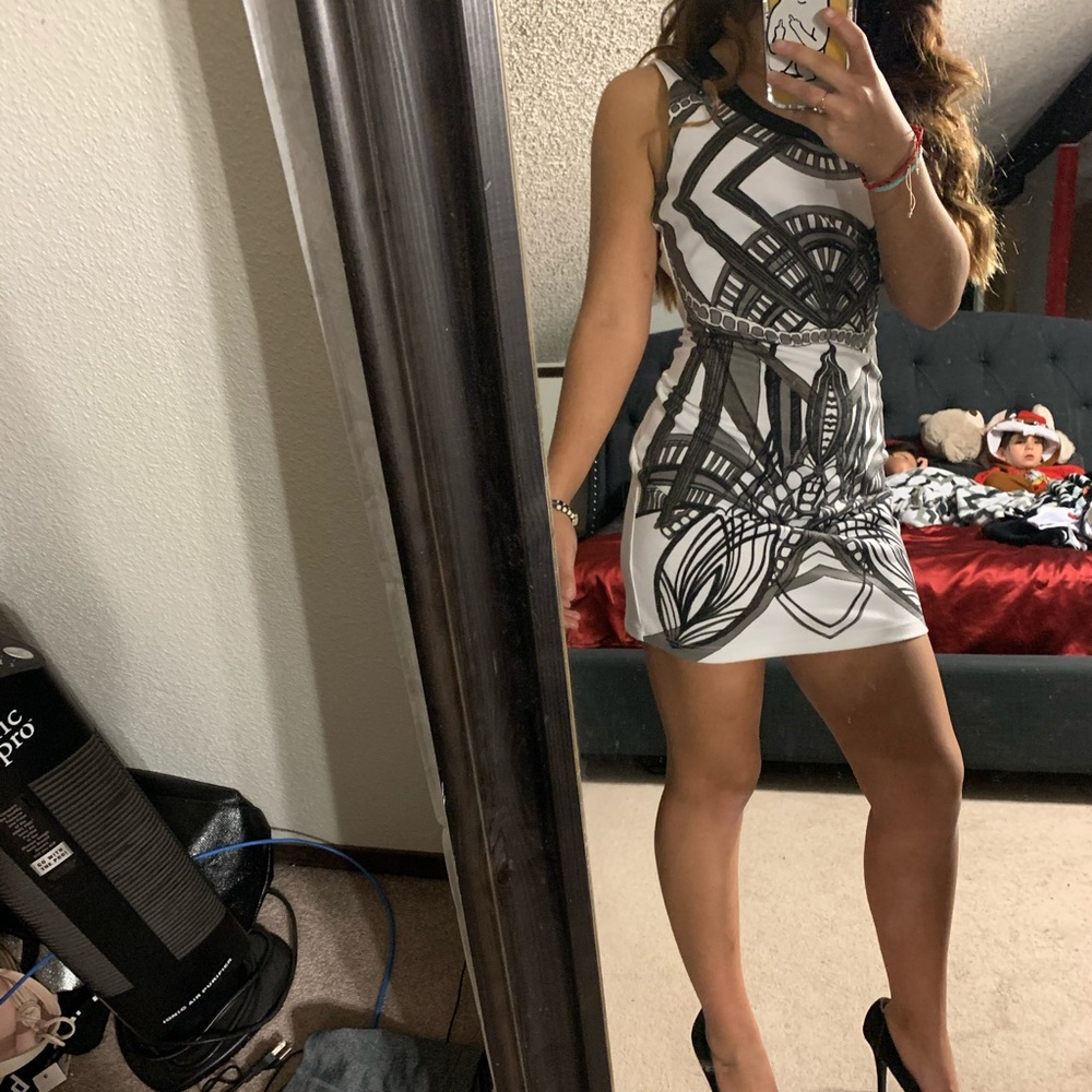 Slightly open back, white, grey and back dress